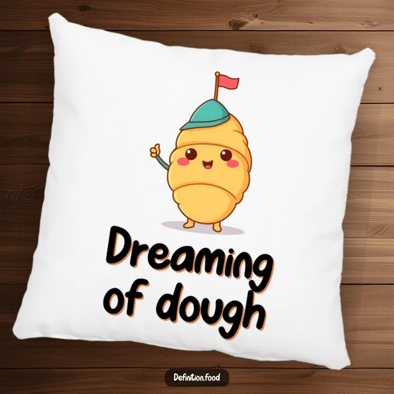 Funny pillow with a cheerful croissant in a jaunty hat waving a tiny flag, ideal for comfort.