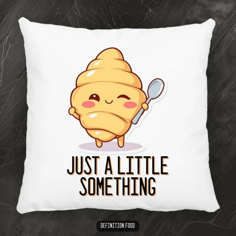 Funny pillow featuring a cute winking croissant character holding a small spoon, providing comfort and a dose of pastry-inspired humor.