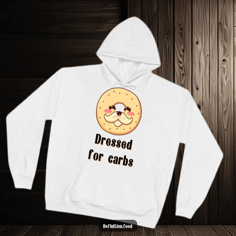 Funny hoodie showcasing a smiling bagel character with a cream cheese mustache, offering cozy warmth and a delightful dose of breakfast humor.